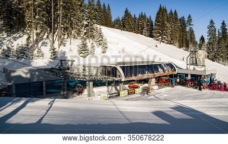 Demanovska Dolina, Slovakia - February 8: Ski Lift Chair And Skiers In Ski Resort Jasna In Low Tatra
