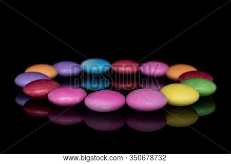 Lot Of Whole Sweet Colourful Candy Circle Isolated On Black Glass