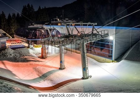 Demanovska Dolina, Slovakia - February 8: Empty Ski Lift Chair At Night In Ski Resort Jasna On Febru