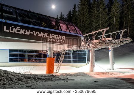 Demanovska Dolina, Slovakia - February 8: Empty Ski Lift Chair At Night In Ski Resort Jasna On Febru