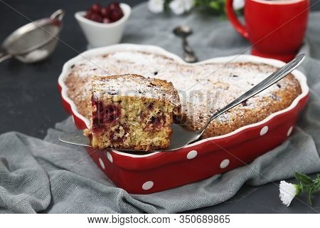 Oatmeal Pie With Cherry, With A Cut Out Piece Of Cake, Sprinkled With Powdered Sugar In A Ceramic Sh