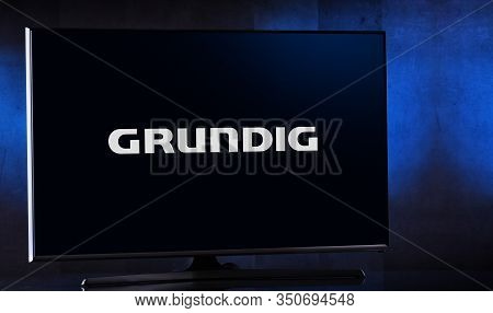 Flat-screen Tv Set Displaying Logo Of Grundig