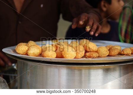 Fusca Chotpoti Is Popular Street Food Of Bangladesh And India. This Food Looks Like Chips.a Roadside