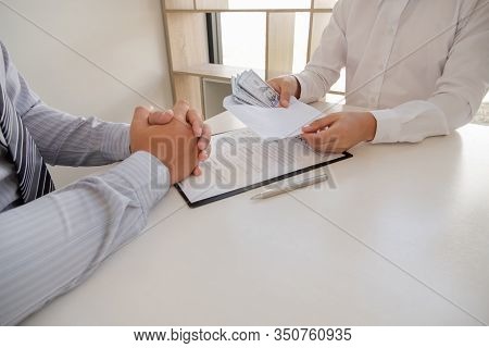 Businessmen Make An Agreement With The Money Proposed His Partner To Bribe In The Company. The Conce