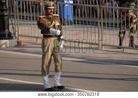 Attari, India - Febuary 8, 2020: Indian Border Security Force Members Face Off Against Pakistan Rang