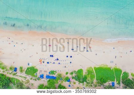 Aerial View Of Beautiful Tropical Beach And Sea With Palm And Other Tree In Phuket Island For Travel