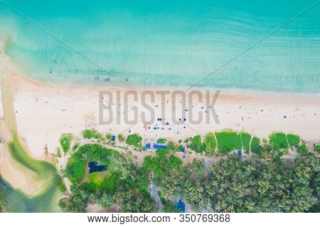 Aerial View Of Beautiful Tropical Beach And Sea With Palm And Other Tree In Phuket Island For Travel