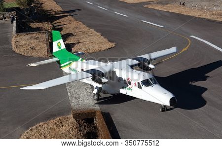 Lukla, Nepal - January 19, 2017: Aircraft Landing On Tenzing - Hillary Airport Runway In Himalaya
