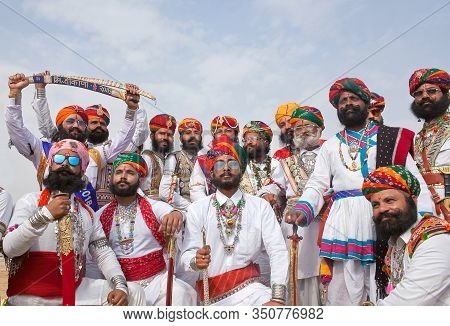 Bikaner, India - January 11, 2019: Indian Men With A Long Mustaches In National Clothes Poses For A 