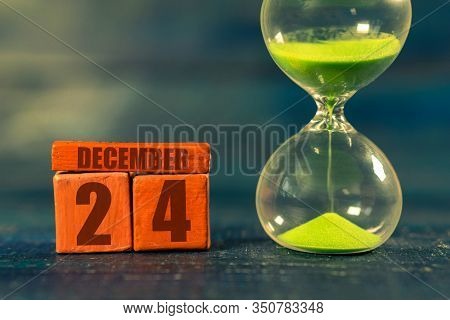 December 24th. Day 24 Of Month, Handmade Wood Cube With Date Month And Day And Hourglass With Green 