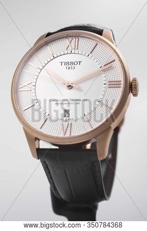 Le Locle, Switzerland 15.01.2020 - Tissot Man Watch Stainless Steel Case, Gold Pvd Coating White Clo