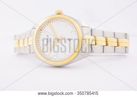 Le Locle, Switzerland 15.01.2020 - Tissot Woman Watch Stainless Steel Case, Gold Pvd Coating White C