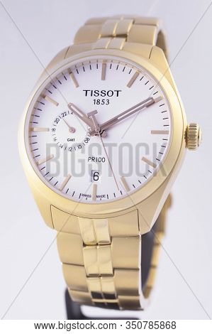 Le Locle, Switzerland 15.01.2020 - Tissot Woman Watch Stainless Steel Case, Gold Pvd Coating White C