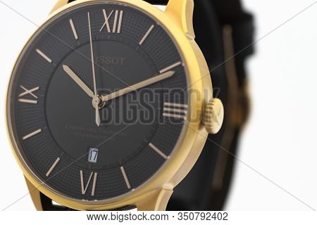Le Locle, Switzerland 15.01.2020 - Tissot Man Watch Stainless Steel Case, Gold Pvd Coating Black Clo