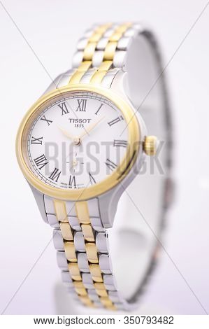 Le Locle, Switzerland 15.01.2020 - Tissot Woman Watch Stainless Steel Case, Gold Pvd Coating White C