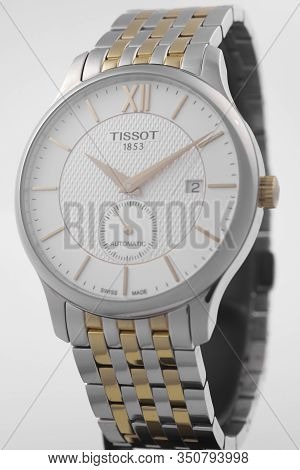 Le Locle, Switzerland 15.01.2020 - Tissot Woman Watch Stainless Steel Case, Gold Pvd Coating White C