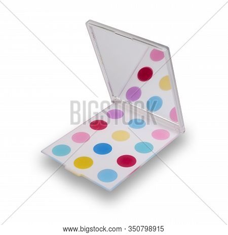 A Funcky Hand Held Compact Mirror With Colourful Spots,  Isolated On White With A Drop Shadow