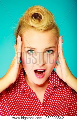 Shocking, Amazed, Astonished Gestures Concept. Shocked Lovely Pin Up Young Girl Holding Head With Ha