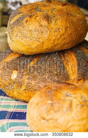 Pieces Loaf Of Bread With Poppy Seeds. Ogranic, Wheat Made Whole Grain Fresh Food.