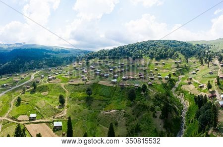 Beautiful Nature With Country Cottages And Traditional Wooden Houses On The Road Through The Goderdz