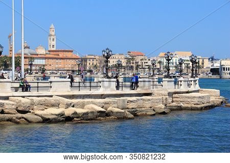 Bari, Italy - May 28, 2017: People Visit Lungomare Boulevard In Bari, Italy. Bari Is The Capital Cit