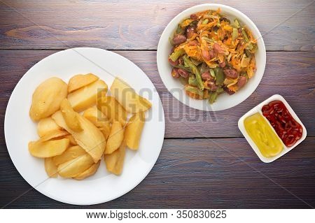 Fry Potatoes With Vegetable Salad On A Pueple Wooden Background. Fry Potatoes On A White Plate