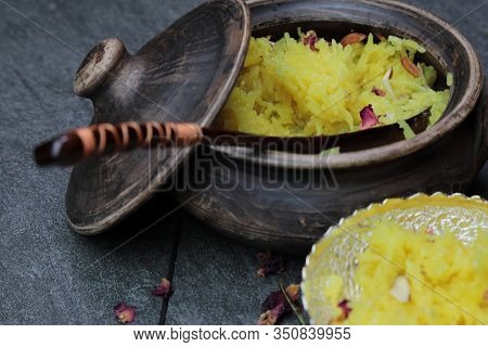 Sweet Rice Or Zarda Pulao On A Grey Background With Copy Space.