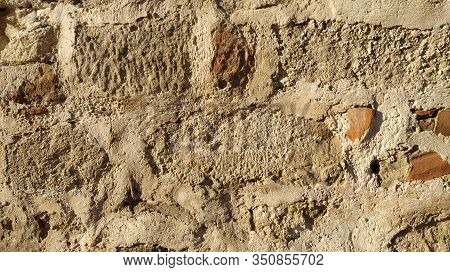 Vintage Turkish Brick Wall. The Restored Wall Of The Turkic Conquerors. Warm Brown-red Shades Of Une