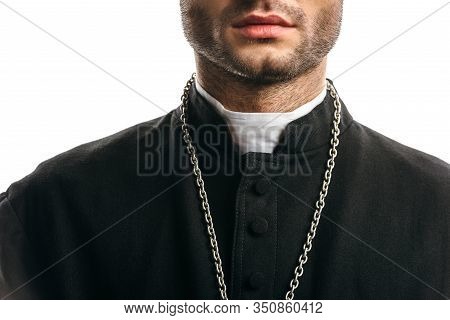 Cropped View Of Catholic Priest In Black Cassock Standing Isolated On White