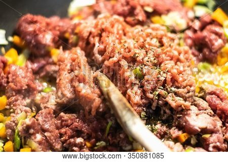 Close Up Of Minced Meat Food Cooking. Healthy Food. Tasty Food. Nutritious Food. Close Up Of Cooking