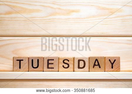 Weekday On Wooden Blocks. Vintage Letterpress Printing Blocks. Tuesday On Toy Cubes. Tuesday Backgro