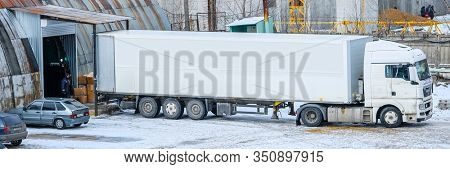 Mosocw, Russia - February, 6, 2020: unloading trailer in Mosocw, Russia