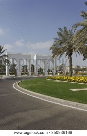 Abu Dhabi, Uae - December 28 2017: Flowerbed At The Entrance Of Abu Dhabi Mosque