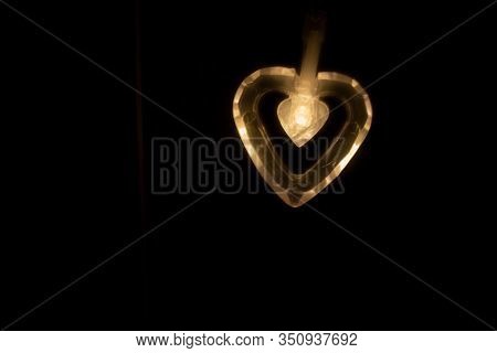 Heart - Shaped Light Bulb In The Dark.
