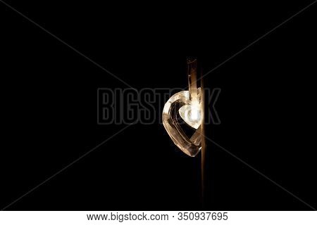 Heart - Shaped Light Bulb In The Dark.