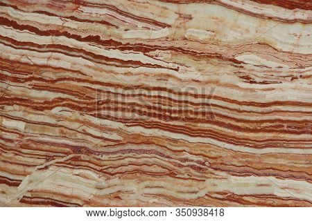 The Texture Of Natural Stones With Beautiful Stripes Of White And Lush Lava Colors Is Called Onice T
