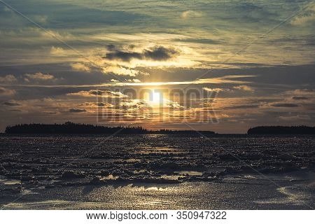 Winter Sunset Over The Ice On The Shores Of Lake Huron