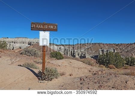 Abiquiu, New Mexico - October 24 2019: Sign At The Entrance To The Hiking Trails And Dramatic White 