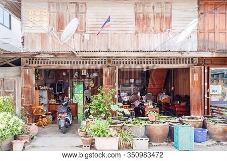 Hua Hin, Thailand - July 13th 2010: Typical Wooden Tek House With Plantpots. The Town Is A Popular T