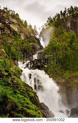 Norwegian Landscape. Waterfall Latefoss Latefossen, Odda Hordaland County In Norway. National Touris