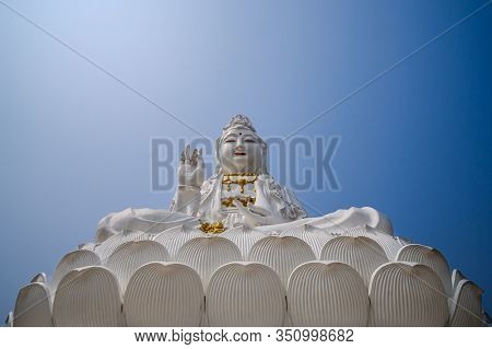 The White Huge Guanyin Statue Located At Wathyuaplakang Temple, Chiangrai Province, Thailand.