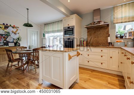 Cavendish, Suffolk - Jan 19 2019: Typical Modern Bedroom With Slatted Wooden Bed And Sidetables With