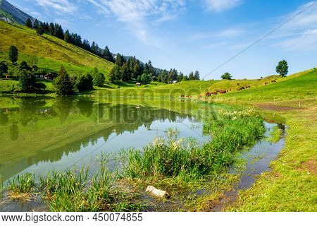 Lake Of The Confins And Mountain Landscape In La Clusaz, Haute-savoie, France