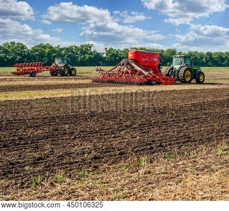 Bilogirya, Khmelnytsky Region, Ukraine - August 19, 2021: Tractors With Seeder At The Demonstration