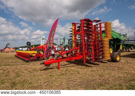 Belogorye, Khmelnytsky Region, Ukraine - August 19, 2021: Red Harrow Vaderstad Folded For Transporta