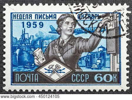 Russia - Circa 1959: A Stamp Printed In The Russia Shows Letter Carrier, International Letter Writin