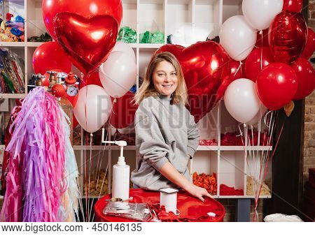 Woman With Composition Of White, Red, Foil Balloons In Form Of Heart And Ball.