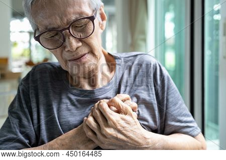 Asian Senior Woman Touching Her Chest,heart Attack,female Elderly Clutching Chest Pain,angina Pector