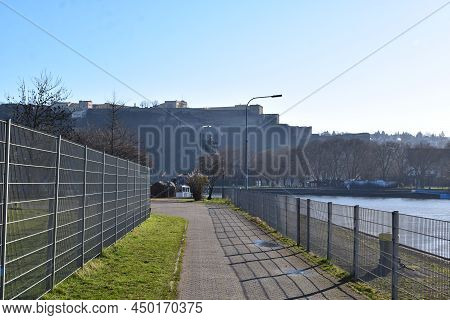 Koblenz, Germany - 02 27 2022: Way Down The Mosel Shore With View To Festung Ehrenbreitstein
