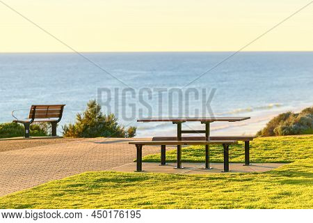 Picnic Table At Maslin Beach Sea Shore At Sunset, South Australia